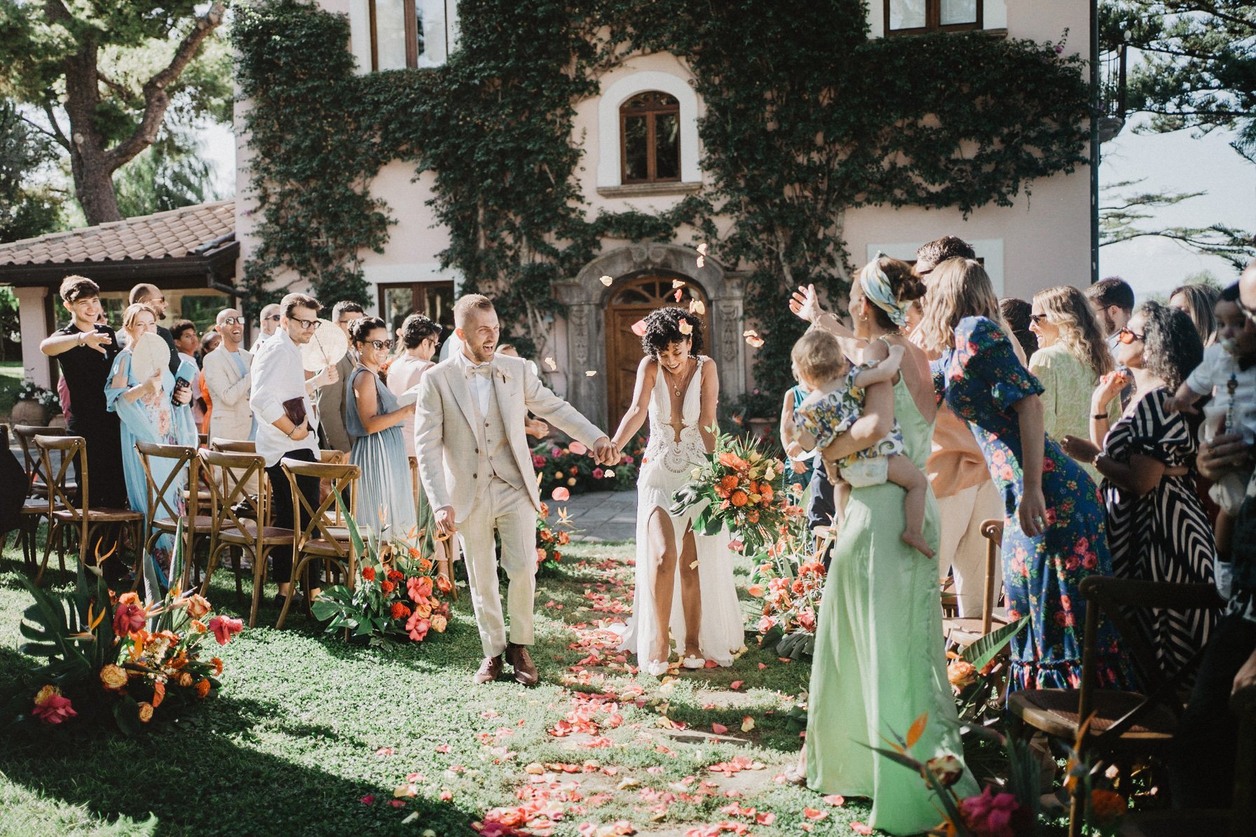 Wedding ceremony floral aisle by the sea, color graded by InPix.Me